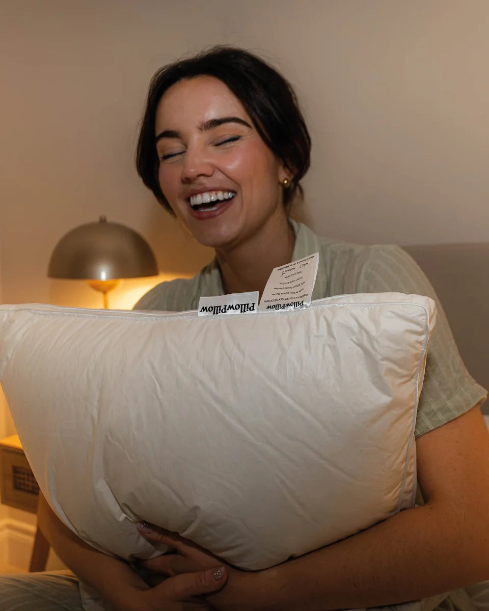 Luxury hotel bed styled with premium pillows and bedding