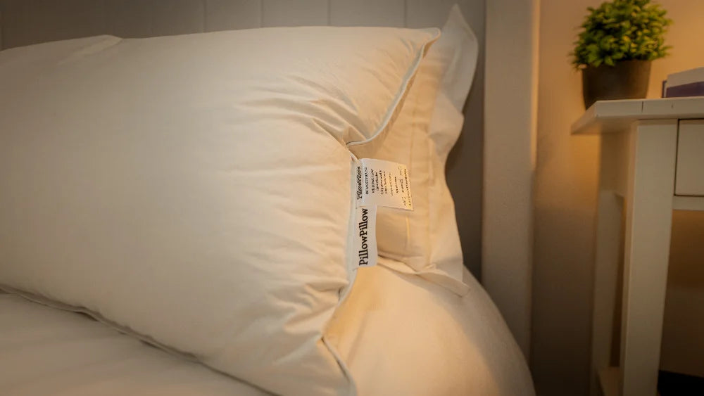 Guest sleeping comfortably in hotel bedding
